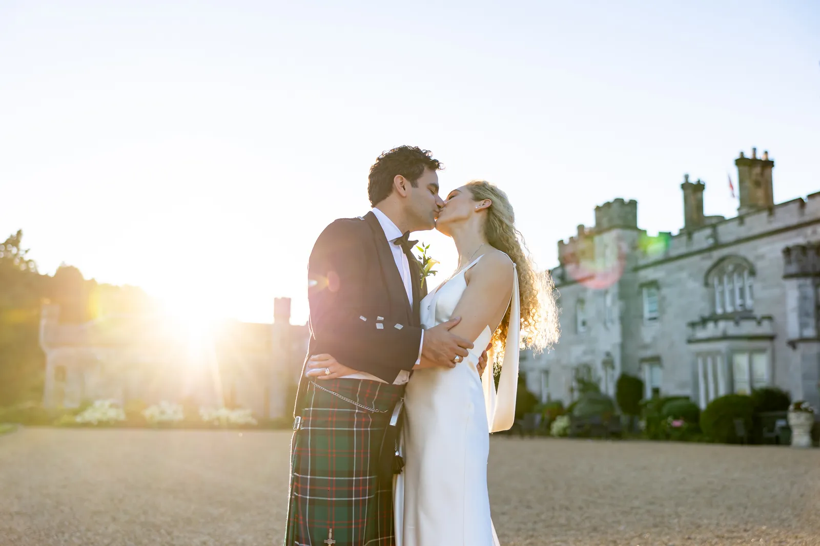 photo of bride and groom in front of dundas castle edinburgh wedding venue