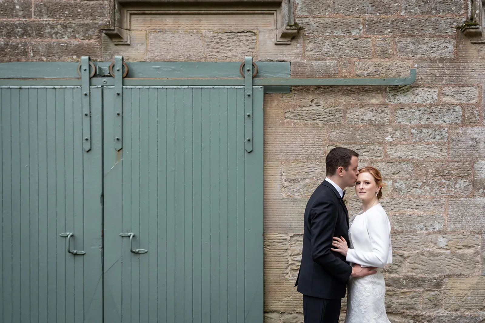 wedderburn castle wedding venue photo of couple in stables