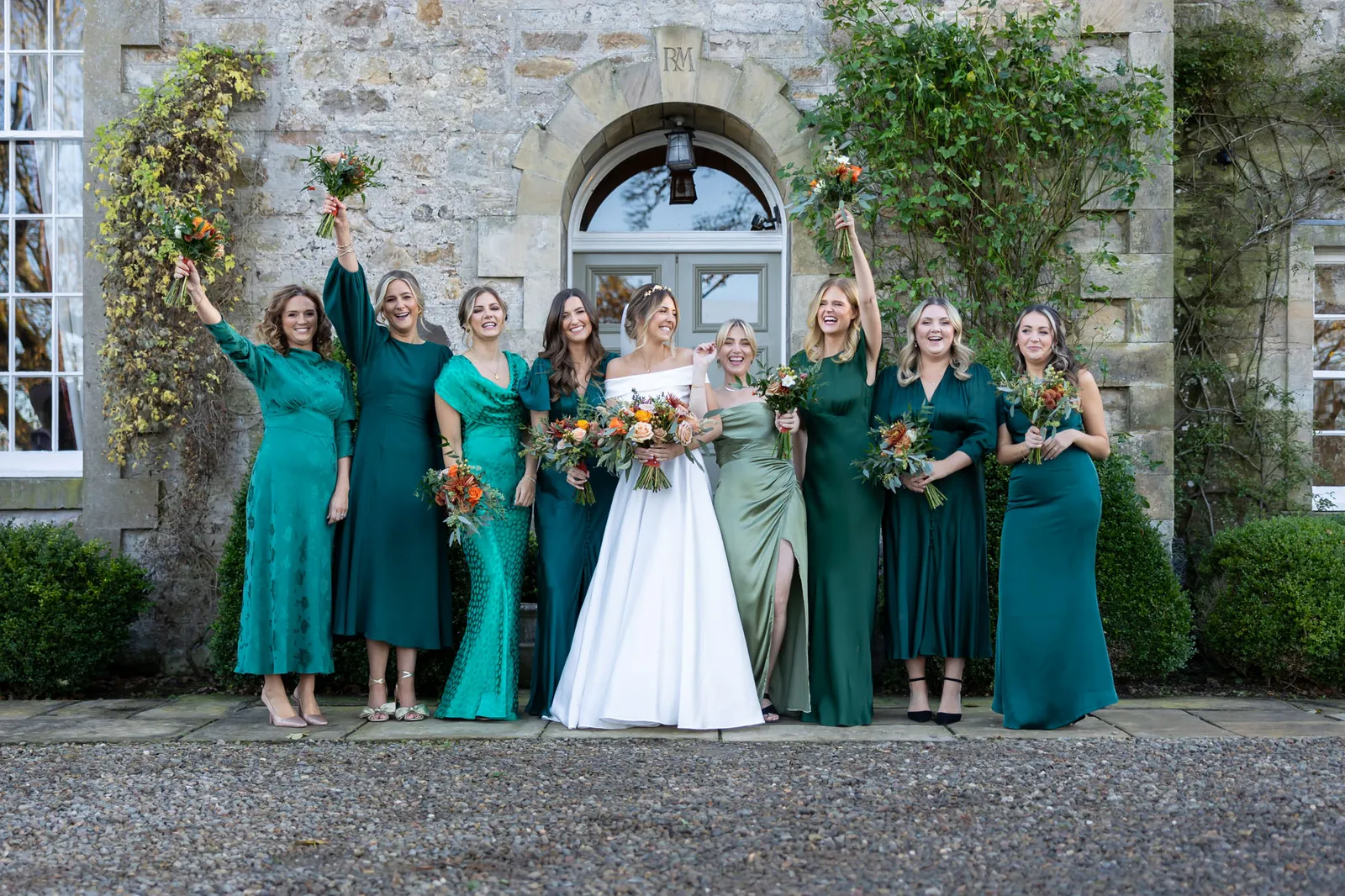 bride and bridesmaids in teal at rosebery house steading wedding venue