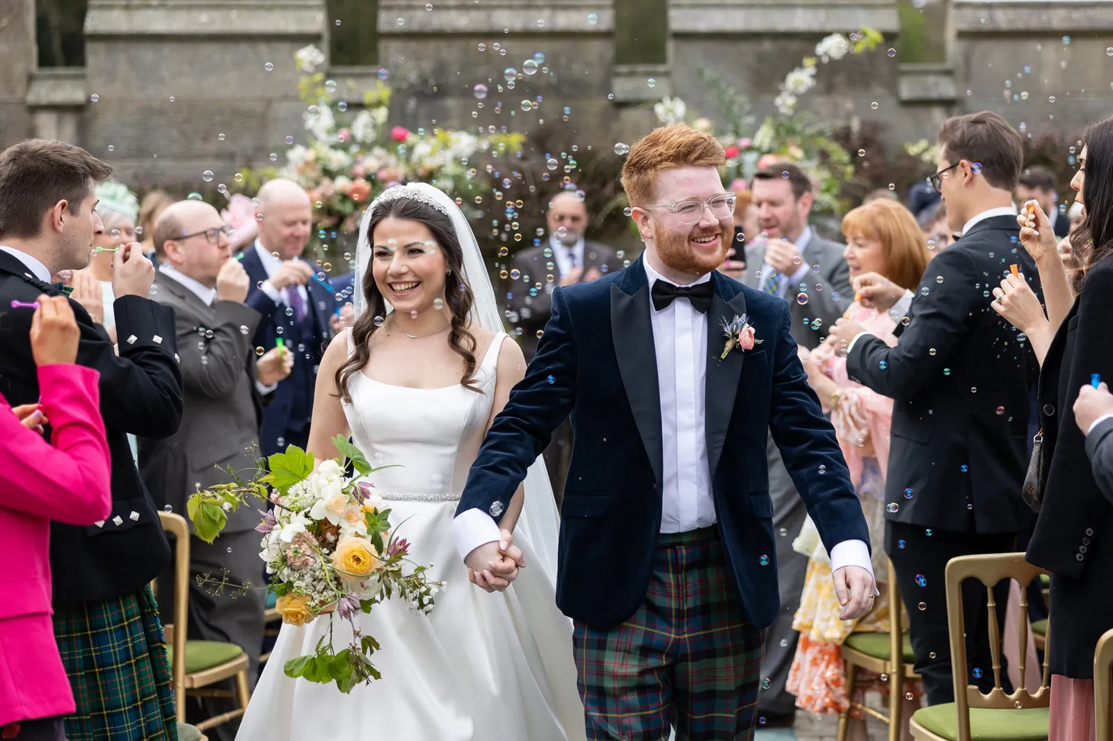 confetti photo of bride and groom at dundas castle in edinburgh